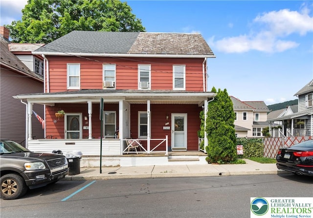 107 B St, Pen Argyl Boro, PA 18072 - view of front of house with covered porch and cooling unit
