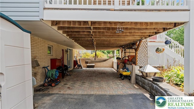 807 Bangor Rd, Plainfield Twp, PA 18064 - view of patio with an attached carport and stairway