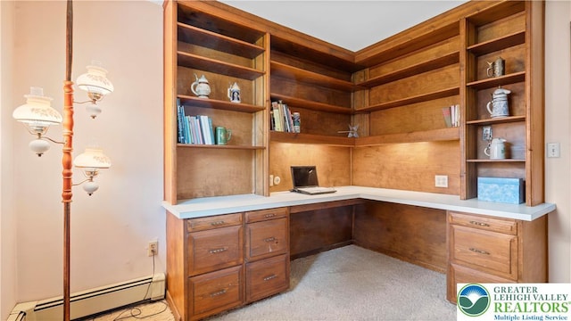 807 Bangor Rd, Plainfield Twp, PA 18064 - unfurnished office featuring built in desk, a baseboard radiator, and light carpet