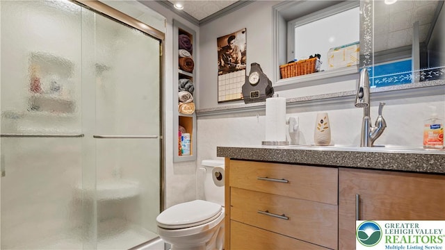 807 Bangor Rd, Plainfield Twp, PA 18064 - bathroom with vanity, a stall shower, and ornamental molding