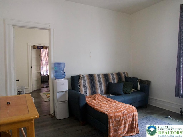 266 E Walnut St, Allentown City, PA 18109 - living area featuring wood finished floors and radiator heating unit