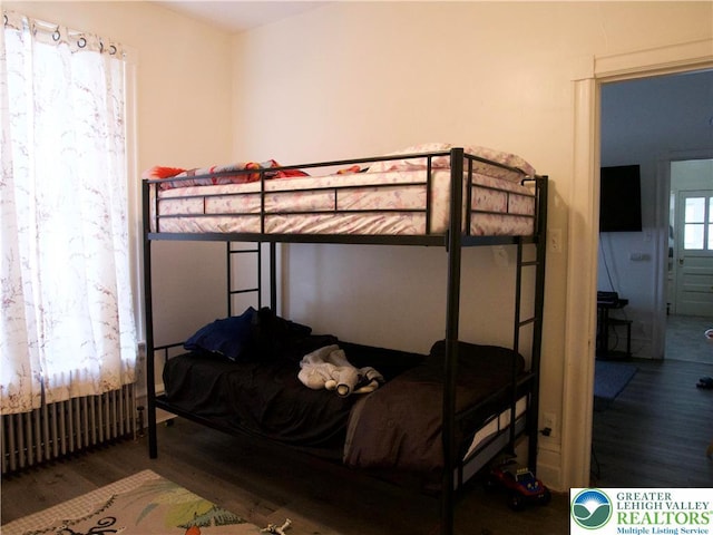 266 E Walnut St, Allentown City, PA 18109 - bedroom with wood finished floors and radiator