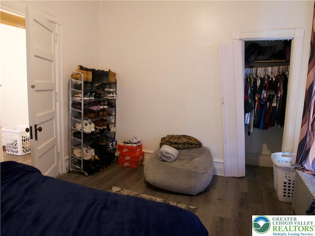 266 E Walnut St, Allentown City, PA 18109 - bedroom with wood finished floors and a closet