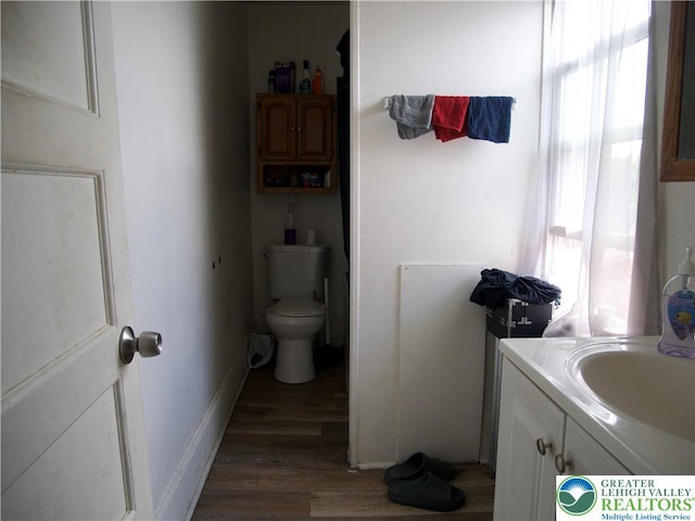 266 E Walnut St, Allentown City, PA 18109 - bathroom with wood finished floors and vanity