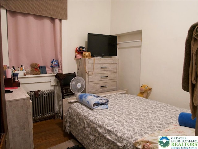 266 E Walnut St, Allentown City, PA 18109 - bedroom with radiator and wood finished floors