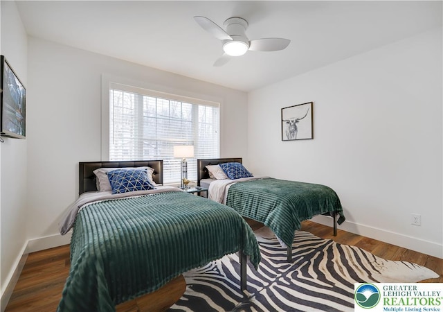 119 Tenicum Trl, Coolbaugh Twp, PA 18347 - bedroom with wood finished floors and a ceiling fan