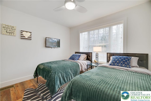119 Tenicum Trl, Coolbaugh Twp, PA 18347 - bedroom with wood finished floors and ceiling fan