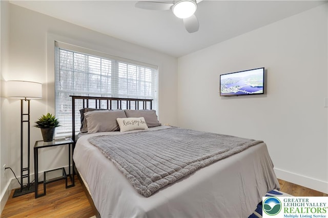 119 Tenicum Trl, Coolbaugh Twp, PA 18347 - bedroom with light wood-type flooring and a ceiling fan