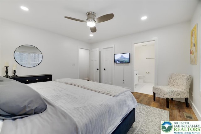 119 Tenicum Trl, Coolbaugh Twp, PA 18347 - bedroom with wood finished floors, recessed lighting, ensuite bath, and ceiling fan