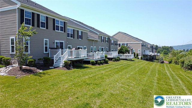 5959 Valley Forge Rd, Upper Saucon Twp, PA 18036 - view of grassy yard with a residential view and a wooden deck