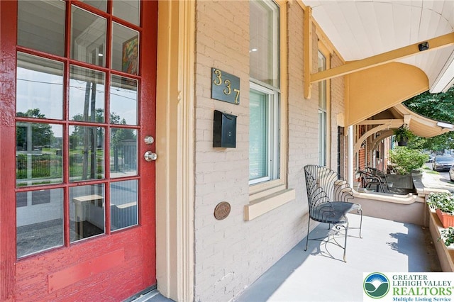 337 N 10th St, Allentown City, PA 18102 - doorway to property featuring covered porch