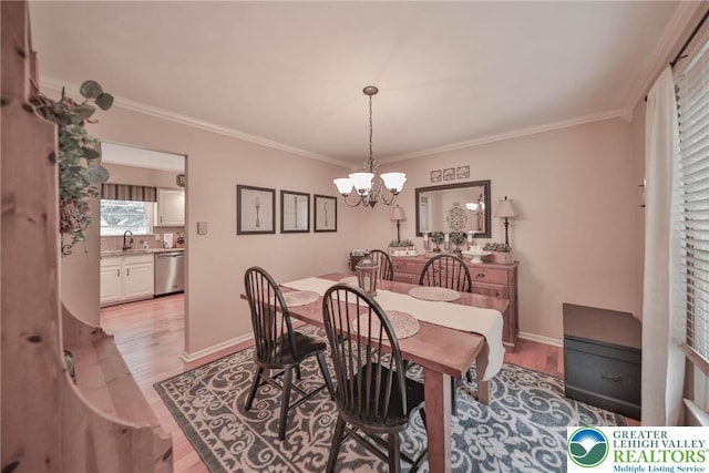 106 Fernwood Dr, Forks Twp, PA 18040 - dining area with a chandelier, light wood-style floors, and crown molding