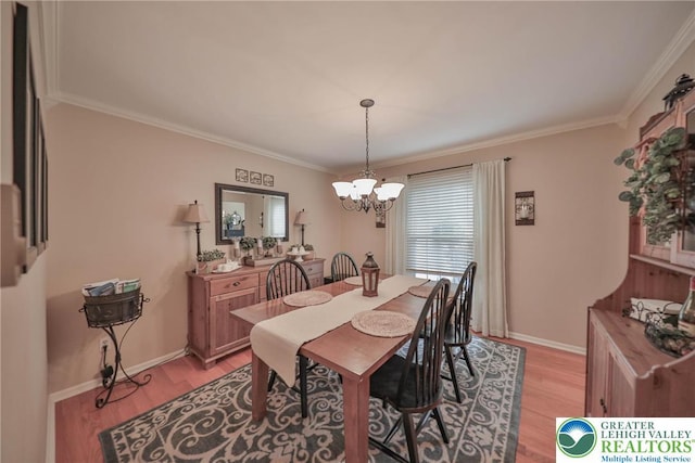 106 Fernwood Dr, Forks Twp, PA 18040 - dining area featuring light wood-style flooring, a chandelier, and ornamental molding