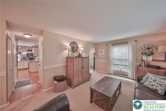 106 Fernwood Dr, Forks Twp, PA 18040 - living room featuring light colored carpet and baseboards