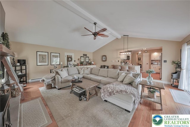 106 Fernwood Dr, Forks Twp, PA 18040 - living room with light wood-style floors, ceiling fan, and baseboard heating