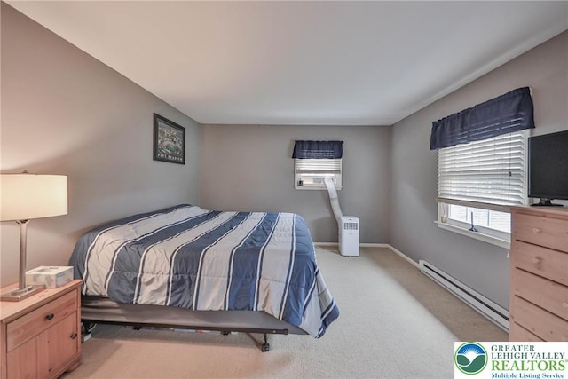 106 Fernwood Dr, Forks Twp, PA 18040 - bedroom featuring baseboard heating and light colored carpet