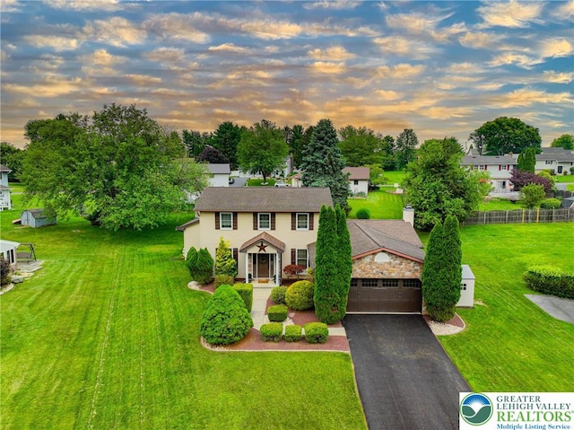 106 Fernwood Dr, Forks Twp, PA 18040 - view of front of property with asphalt driveway and a garage