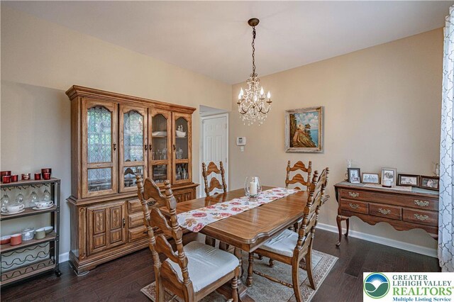 3213 Overlook Dr, Lower Macungie Twp, PA 18049 - dining space featuring a chandelier and dark wood-style flooring