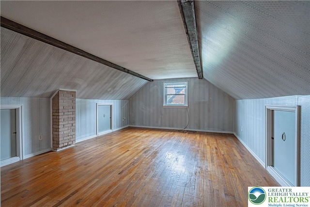 3344 Winchester Rd, Allentown City, PA 18104 - additional living space featuring hardwood / wood-style floors and lofted ceiling