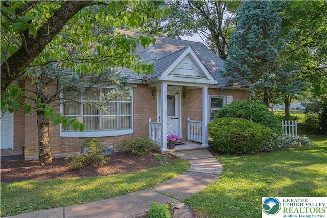 3344 Winchester Rd, Allentown City, PA 18104 - bungalow-style house featuring brick siding and a front lawn