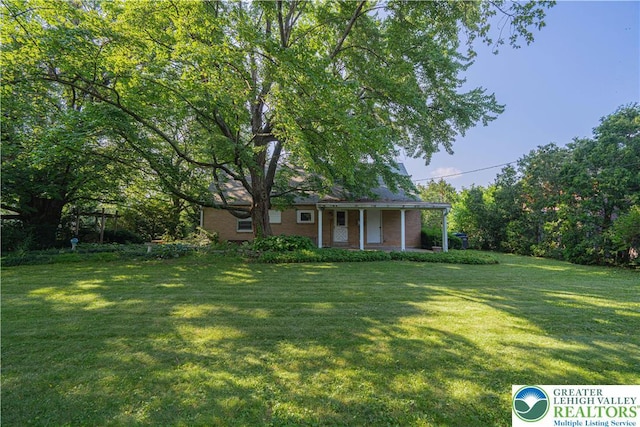 3344 Winchester Rd, Allentown City, PA 18104 - view of front facade with a front lawn and a porch