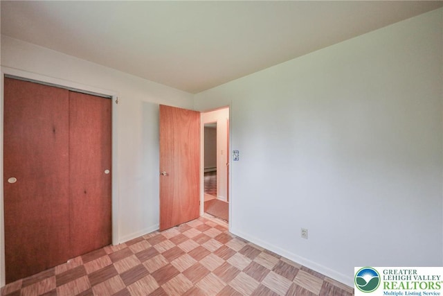 60 Maple Dr, Lower Towamensing Tp, PA 18071 - unfurnished bedroom with baseboards and a closet