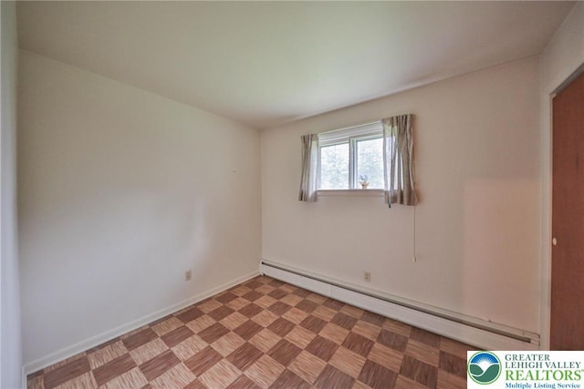 60 Maple Dr, Lower Towamensing Tp, PA 18071 - spare room featuring a baseboard heating unit and baseboards