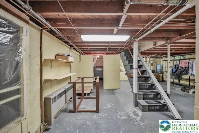 60 Maple Dr, Lower Towamensing Tp, PA 18071 - unfinished basement featuring stairs, radiator, and heating fuel
