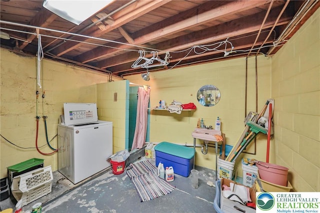 60 Maple Dr, Lower Towamensing Tp, PA 18071 - unfinished below grade area with concrete block wall and fridge