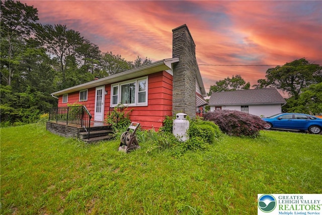 60 Maple Dr, Lower Towamensing Tp, PA 18071 - view of front of home featuring a lawn and a chimney