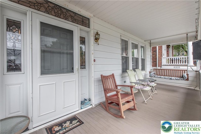 242 N Lehigh St, Tamaqua Boro, PA 18252 - doorway to property featuring a porch