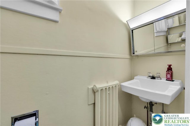 242 N Lehigh St, Tamaqua Boro, PA 18252 - half bath with radiator heating unit and a sink