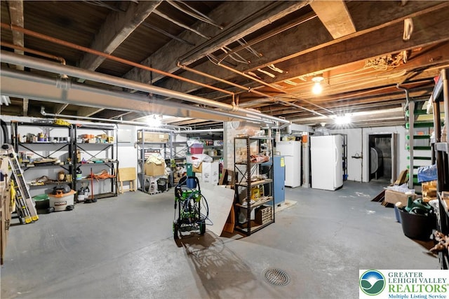 242 N Lehigh St, Tamaqua Boro, PA 18252 - unfinished below grade area with water heater and freestanding refrigerator