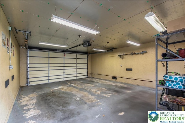 242 N Lehigh St, Tamaqua Boro, PA 18252 - garage featuring a garage door opener