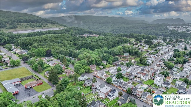 242 N Lehigh St, Tamaqua Boro, PA 18252 - aerial perspective of suburban area with a forest and mountains