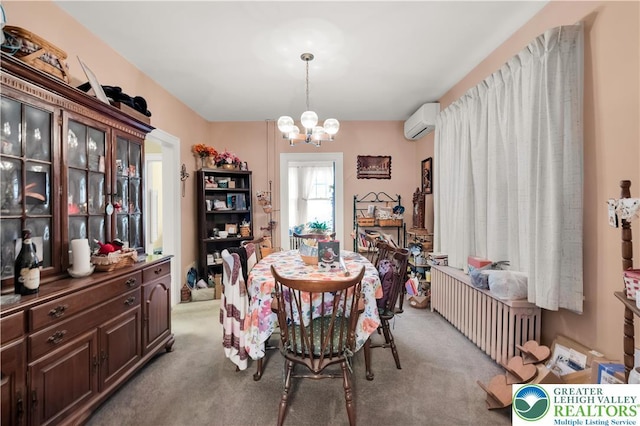 242 N Lehigh St, Tamaqua Boro, PA 18252 - dining space featuring light colored carpet, radiator, a chandelier, and a wall mounted AC