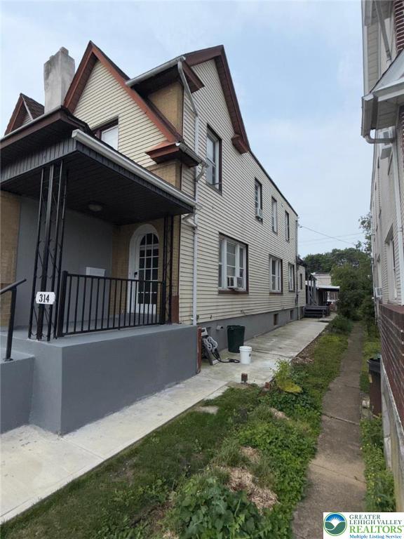 314 S Saint Cloud St, Allentown City, PA 18104 - view of side of property featuring a chimney
