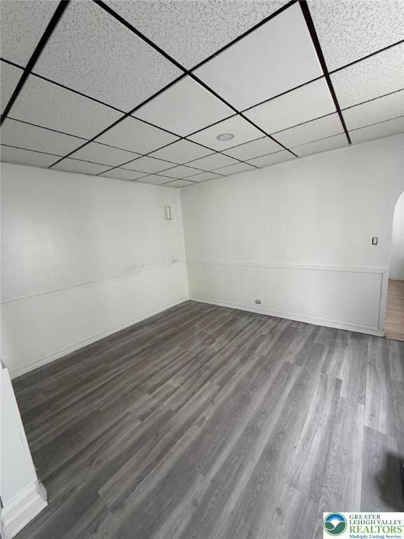 314 S Saint Cloud St, Allentown City, PA 18104 - empty room with wood finished floors and a drop ceiling