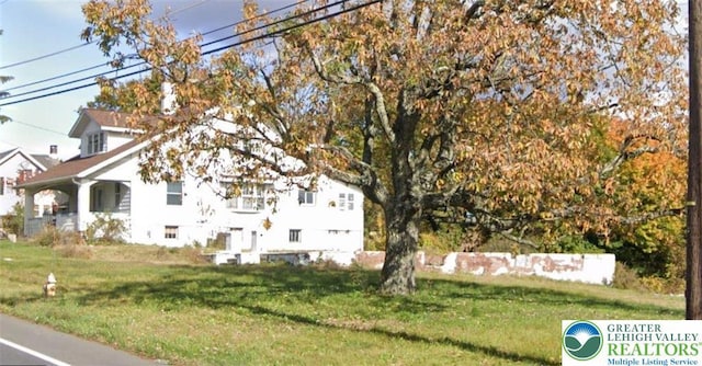 6366 Sullivan Trl, Pen Argyl Boro, PA 18091 - view of property exterior featuring a lawn