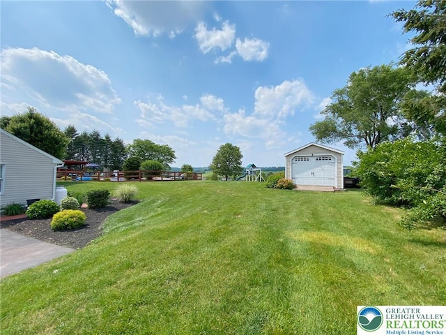 5545 Roberts Rd, North Whitehall Twp, PA 18078 - view of yard with an outbuilding, a playground, and a garage
