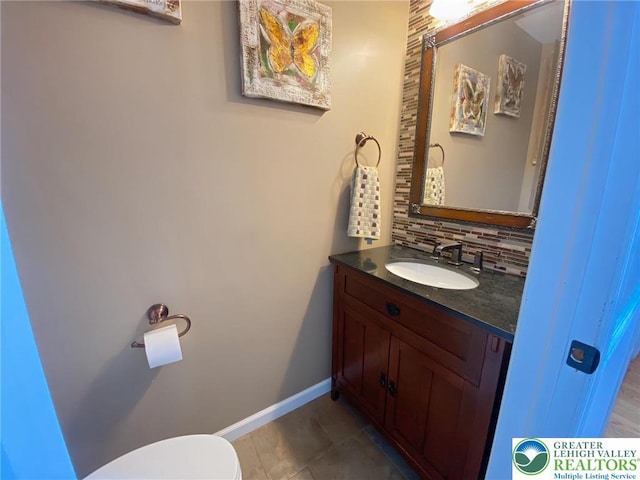 5545 Roberts Rd, North Whitehall Twp, PA 18078 - half bathroom featuring backsplash, vanity, and tile patterned floors