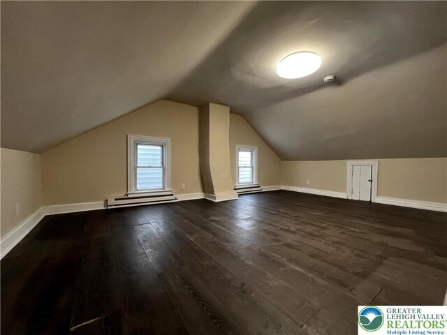 142 Front St, Catasauqua Boro, PA 18032 - additional living space featuring a baseboard radiator, dark wood finished floors, and vaulted ceiling