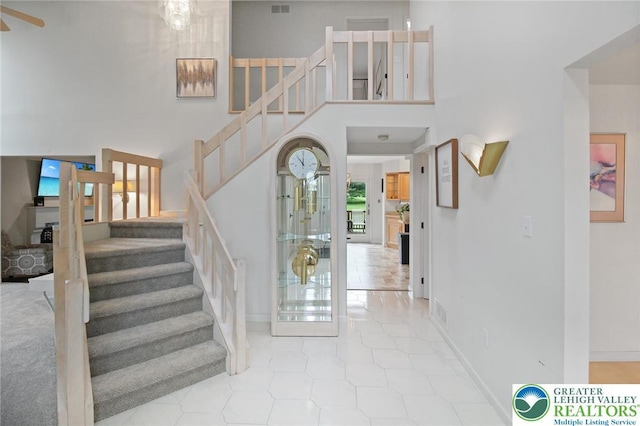 75 Marshall Run, Allen Twp, PA 18067 - staircase with a high ceiling and ceiling fan