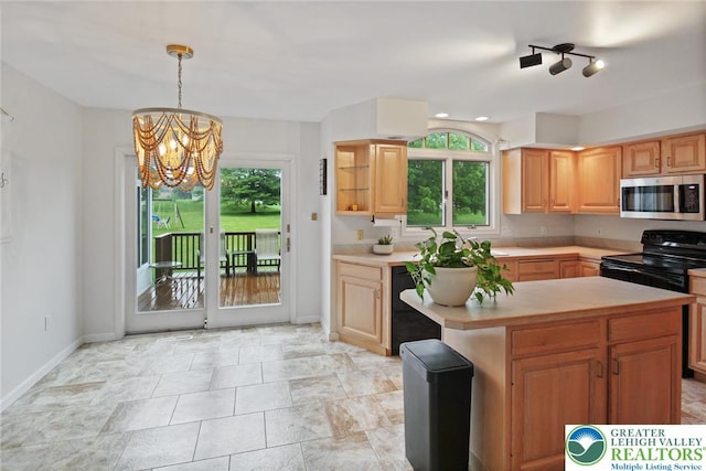 75 Marshall Run, Allen Twp, PA 18067 - kitchen featuring black appliances, light countertops, a chandelier, decorative light fixtures, and a center island
