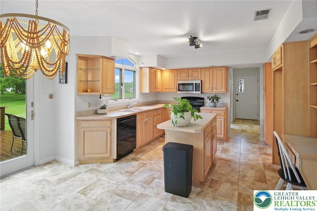 75 Marshall Run, Allen Twp, PA 18067 - kitchen featuring black appliances, light countertops, a center island, and light brown cabinetry