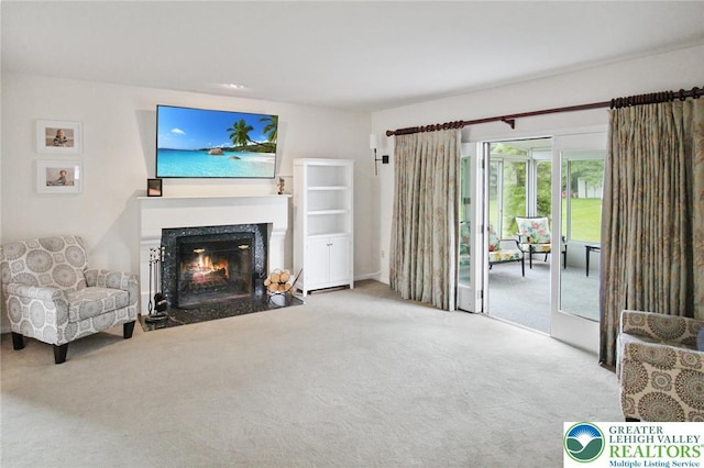 75 Marshall Run, Allen Twp, PA 18067 - living area with carpet floors and a fireplace with flush hearth