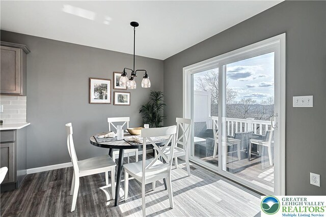 3220 Eisenhower Dr, Allen Twp, PA 18067 - dining room with wood finished floors and a chandelier