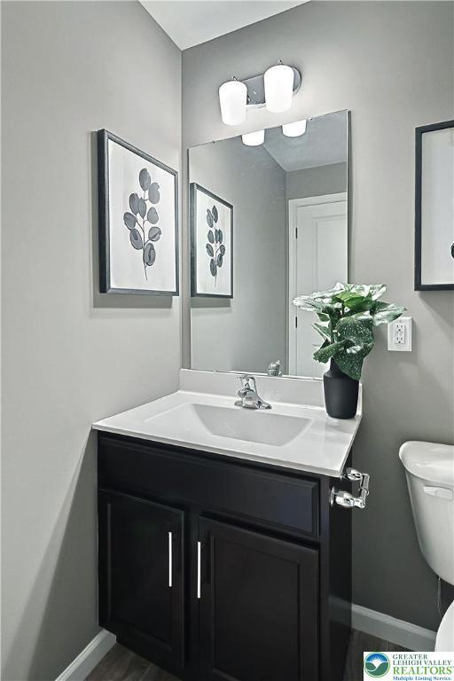 3220 Eisenhower Dr, Allen Twp, PA 18067 - half bath featuring vanity and baseboards