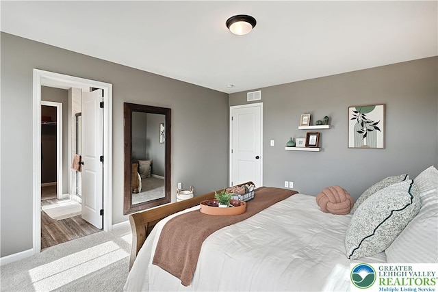 3220 Eisenhower Dr, Allen Twp, PA 18067 - bedroom with carpet flooring and baseboards