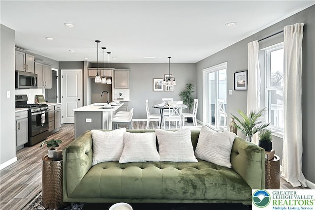 3220 Eisenhower Dr, Allen Twp, PA 18067 - living area featuring dark wood finished floors and recessed lighting
